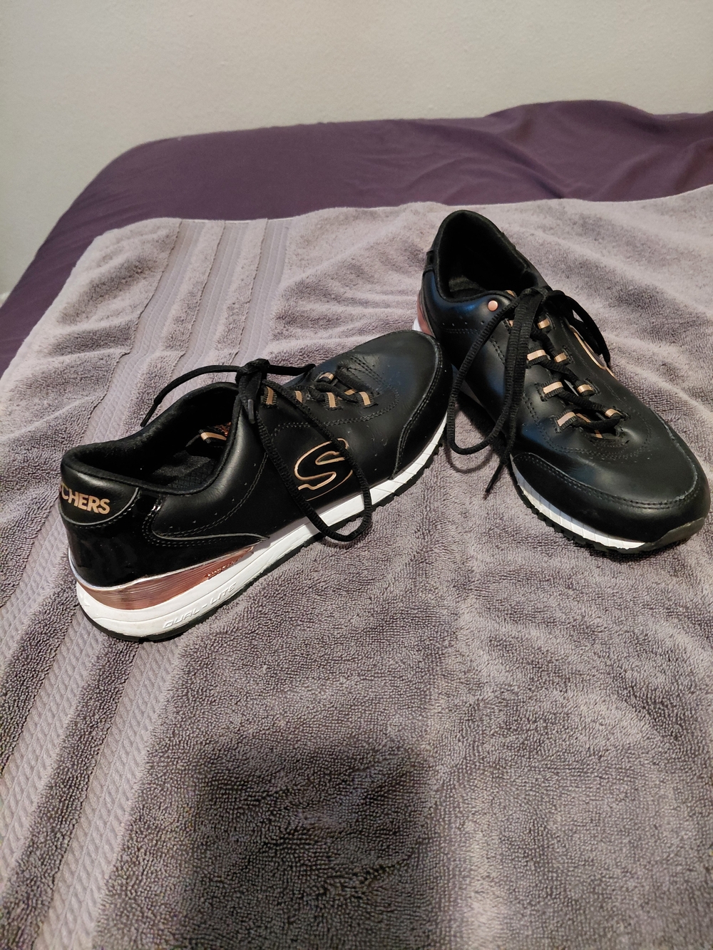 Skechers Black Sneakers with Rose Gold Accents for Women